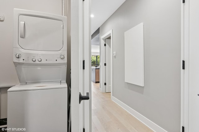 1523 N Western Ave Unit 2A, Chicago, IL 60622 - laundry area with stacked washer / dryer, light wood finished floors, and recessed lighting