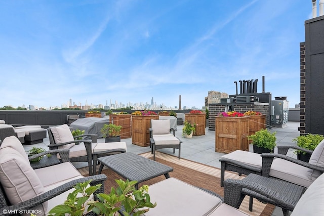 1523 N Western Ave Unit 2A, Chicago, IL 60622 - view of patio / terrace featuring an outdoor living space, a view of skyline, and grilling area