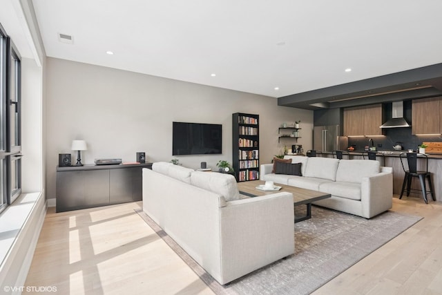 1523 N Western Ave Unit 2A, Chicago, IL 60622 - living room featuring light wood-type flooring and recessed lighting