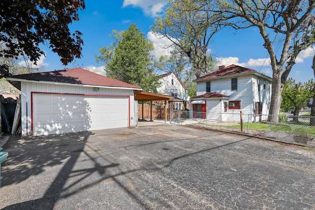 434 4th Ave, Joliet, IL 60433 - view of front facade with a detached garage and an outdoor structure