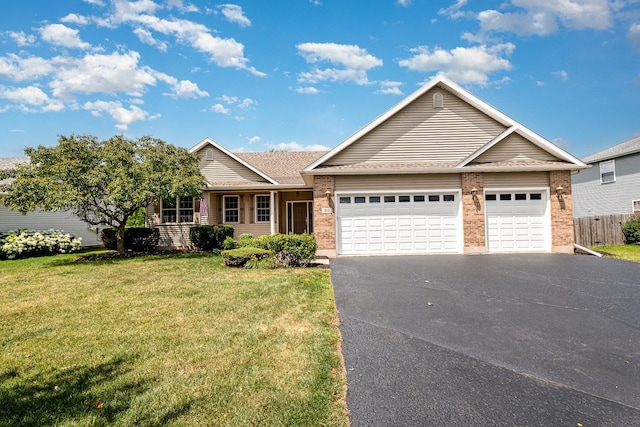 313 W Burlington Dr, Maple Park, IL 60151 - ranch-style house featuring asphalt driveway, an attached garage, and brick siding