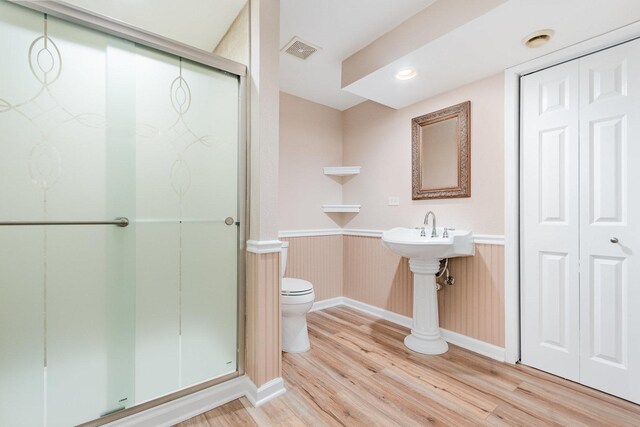 313 W Burlington Dr, Maple Park, IL 60151 - full bath with wood finished floors, a stall shower, and a wainscoted wall
