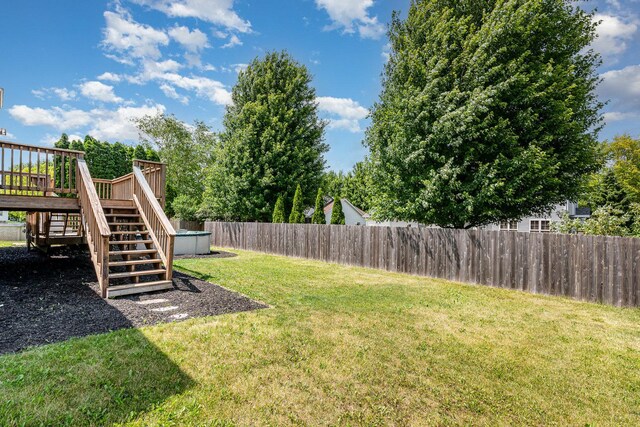 313 W Burlington Dr, Maple Park, IL 60151 - fenced backyard with stairway and a wooden deck