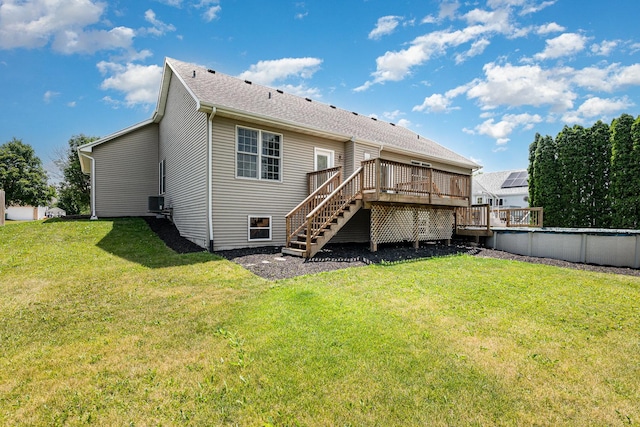 313 W Burlington Dr, Maple Park, IL 60151 - rear view of house featuring a wooden deck, stairs, a lawn, and an outdoor pool