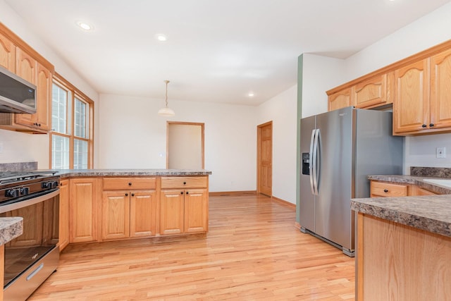 313 W Burlington Dr, Maple Park, IL 60151 - kitchen featuring stainless steel appliances, light wood-type flooring, a peninsula, pendant lighting, and recessed lighting