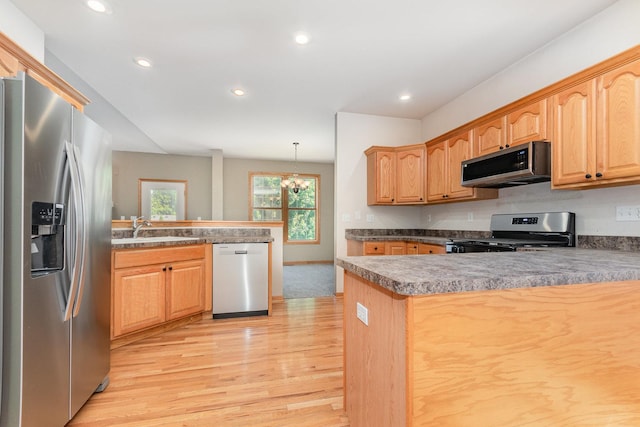 313 W Burlington Dr, Maple Park, IL 60151 - kitchen featuring stainless steel appliances, a peninsula, light wood-style floors, recessed lighting, and a chandelier