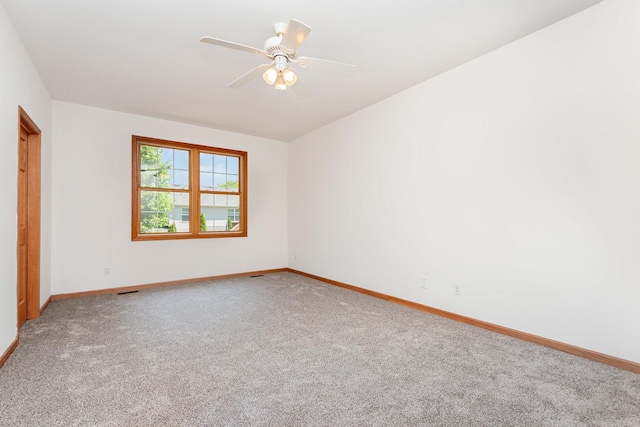 313 W Burlington Dr, Maple Park, IL 60151 - carpeted empty room with baseboards and a ceiling fan