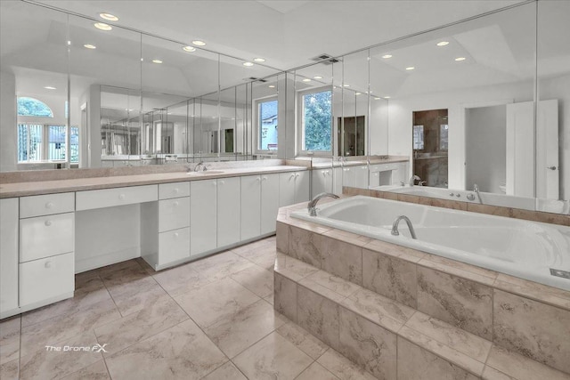 3550 E Ari Dr, Glenview, IL 60025 - bathroom featuring a garden tub, vanity, and recessed lighting
