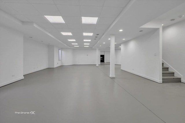 3550 E Ari Dr, Glenview, IL 60025 - basement with a paneled ceiling, stairs, and recessed lighting