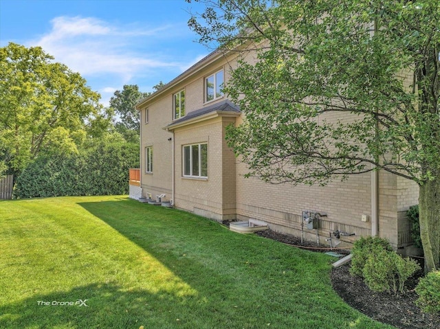 3550 E Ari Dr, Glenview, IL 60025 - view of property exterior with brick siding and a lawn