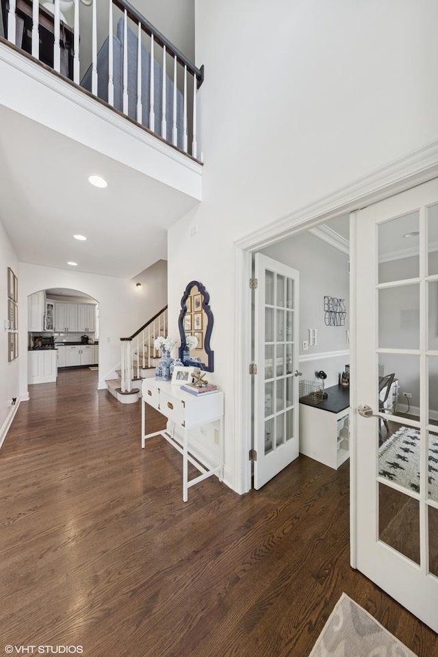 1000 S Madison Ave, La Grange, IL 60525 - foyer entrance with french doors, arched walkways, stairway, and wood finished floors
