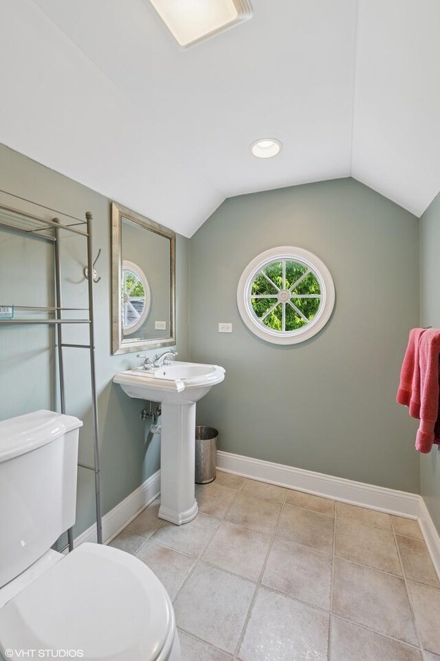 1000 S Madison Ave, La Grange, IL 60525 - bathroom featuring lofted ceiling and tile patterned floors