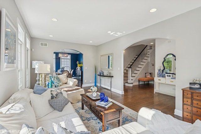 1000 S Madison Ave, La Grange, IL 60525 - living area featuring arched walkways, stairs, wood finished floors, and recessed lighting