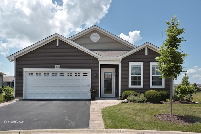 2351 Cannon Dr, Pingree Grove, IL 60140 - ranch-style home featuring driveway, a front lawn, a garage, and a shingled roof