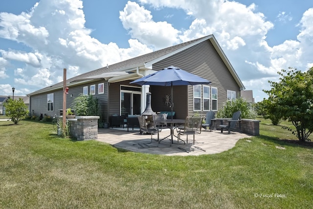 2351 Cannon Dr, Pingree Grove, IL 60140 - back of property with a patio area and a lawn