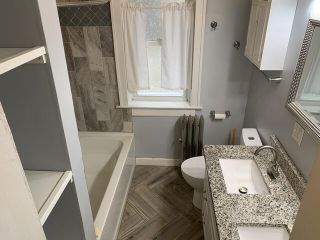 full bath with radiator and vanity