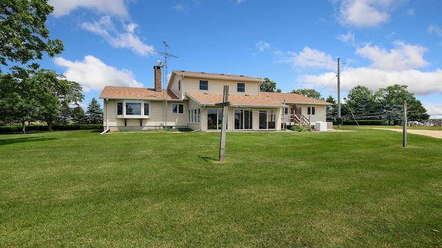 10245 W Penn Cor, Polo, IL 61064 - back of property with a chimney and a yard