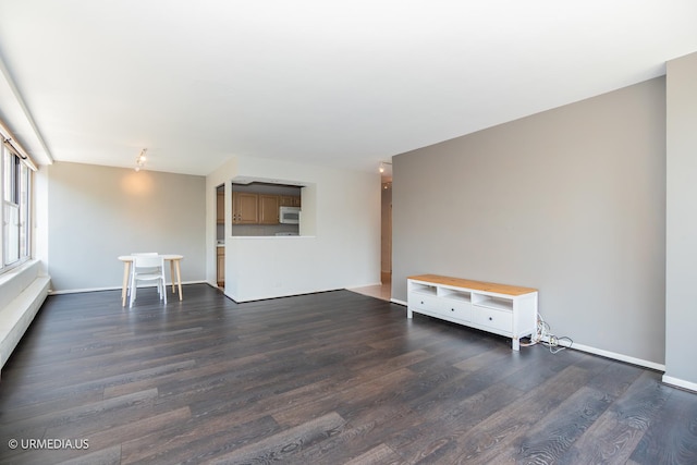 3900 N Lake Shore Dr Unit 3E, Chicago, IL 60613 - unfurnished room featuring dark wood-style flooring and baseboards