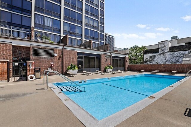 1636 N Wells Ave Unit 2014, Chicago, IL 60614 - community pool featuring a patio
