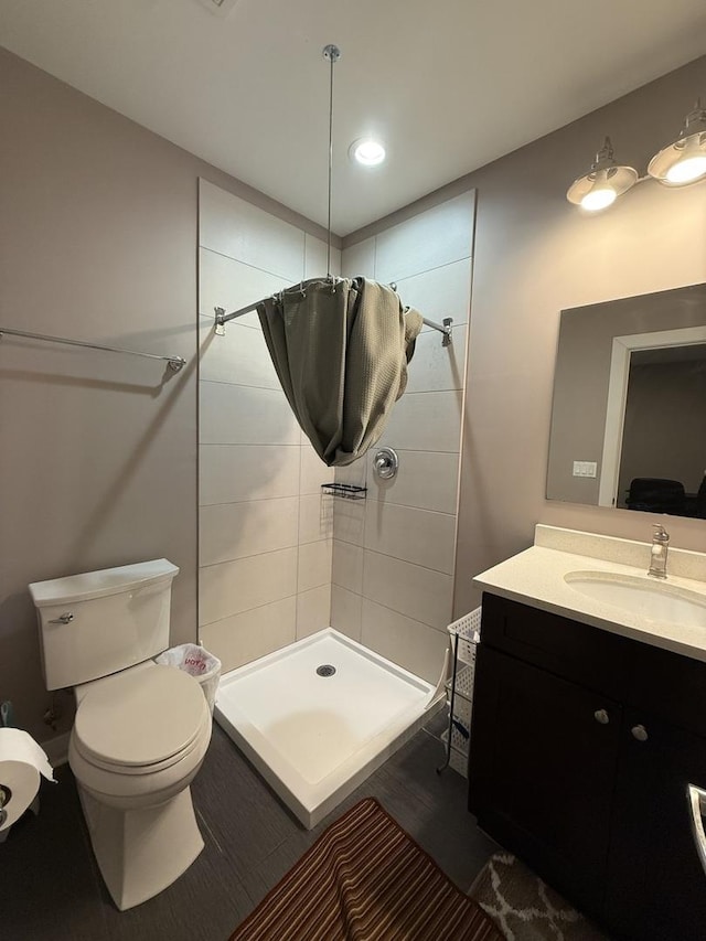 1017 S Claremont Ave, Chicago, IL 60612 - full bathroom with a tile shower, vanity, and recessed lighting