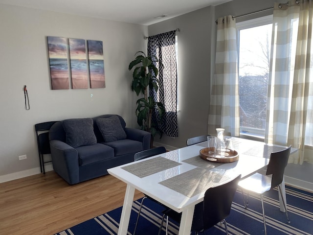 1017 S Claremont Ave, Chicago, IL 60612 - dining space with wood finished floors and baseboards