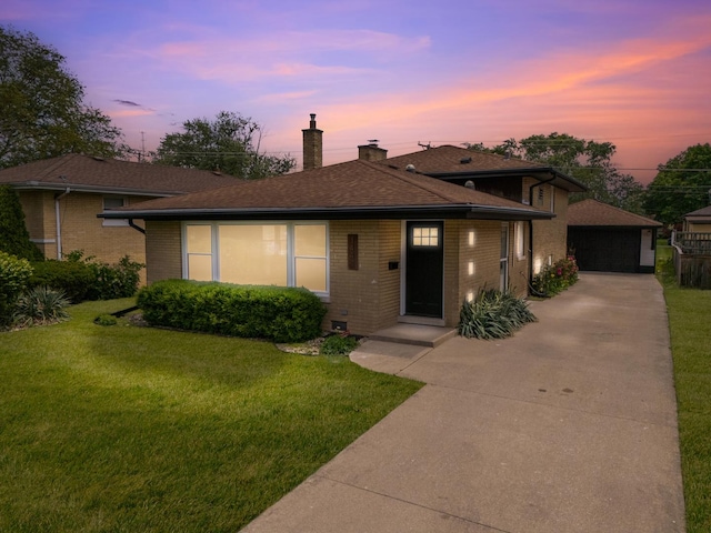 1441 Forest Rd, La Grange Park, IL 60526 - ranch-style home with a chimney, brick siding, a lawn, and a garage