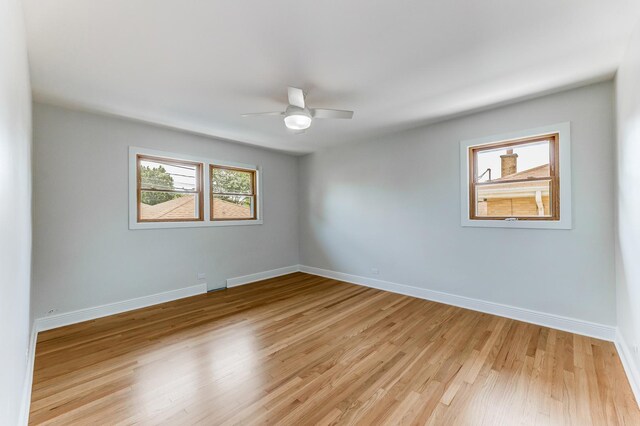 1441 Forest Rd, La Grange Park, IL 60526 - empty room with light wood finished floors and ceiling fan