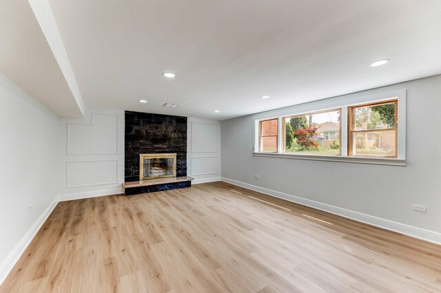 1441 Forest Rd, La Grange Park, IL 60526 - unfurnished living room with light wood finished floors, a high end fireplace, and recessed lighting