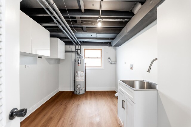 1441 Forest Rd, La Grange Park, IL 60526 - basement with gas water heater and light wood-style flooring
