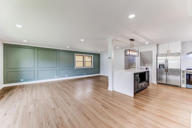 1441 Forest Rd, La Grange Park, IL 60526 - kitchen with stainless steel refrigerator with ice dispenser, stove, recessed lighting, a decorative wall, and light wood-style flooring