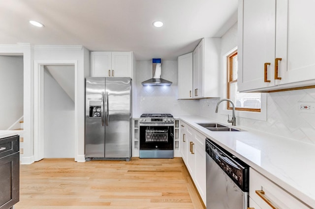 1441 Forest Rd, La Grange Park, IL 60526 - kitchen with appliances with stainless steel finishes, wall chimney exhaust hood, recessed lighting, backsplash, and white cabinets