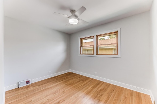 1441 Forest Rd, La Grange Park, IL 60526 - unfurnished room with light wood-style floors and a ceiling fan