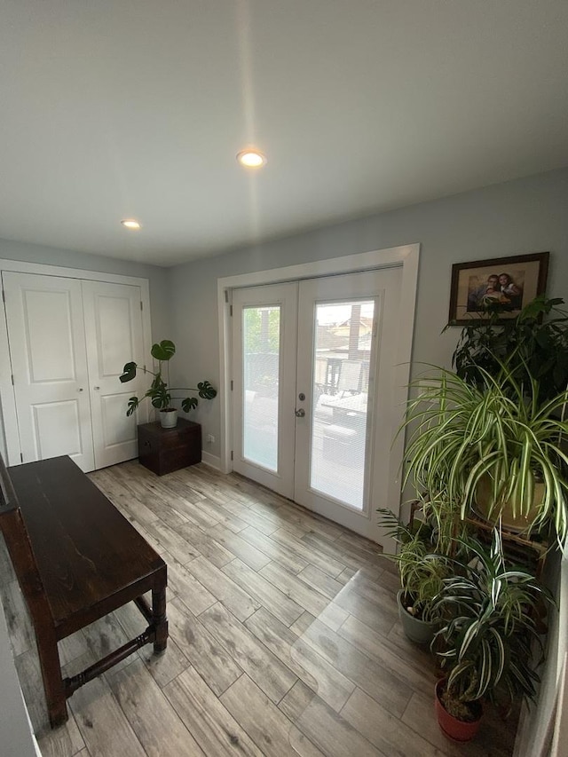 2142 N 73rd Ct, Elmwood Park, IL 60707 - entryway featuring light wood-type flooring, french doors, and recessed lighting