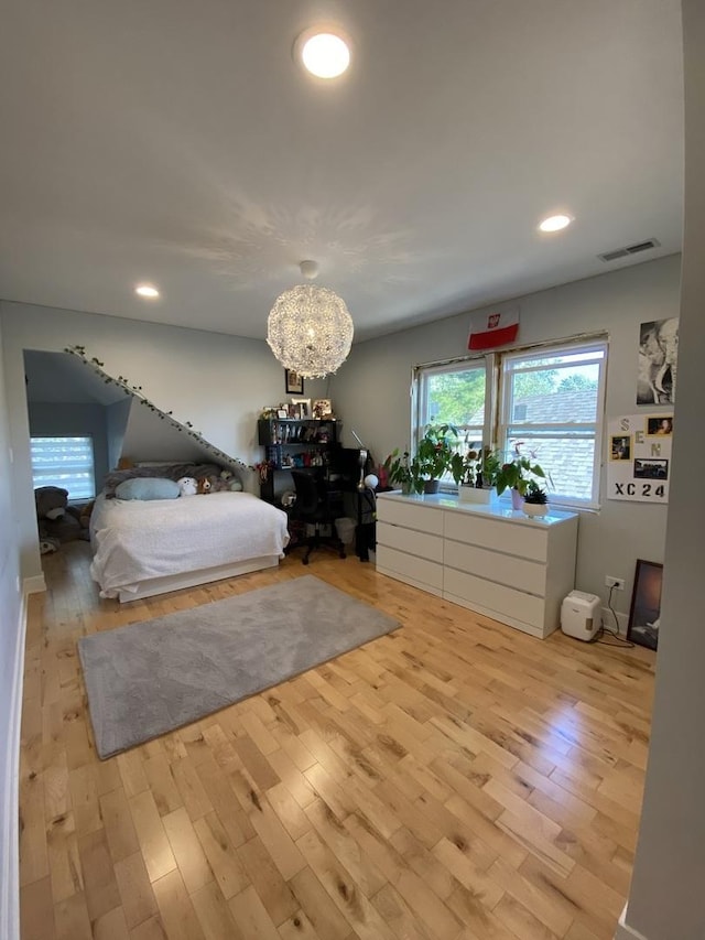 2142 N 73rd Ct, Elmwood Park, IL 60707 - bedroom featuring wood finished floors, a chandelier, and recessed lighting