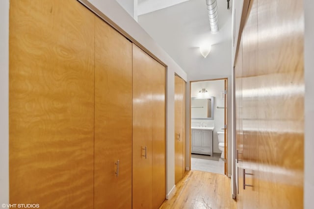 1000 W Washington Blvd Unit 320, Chicago, IL 60607 - corridor with light wood finished floors and a sink