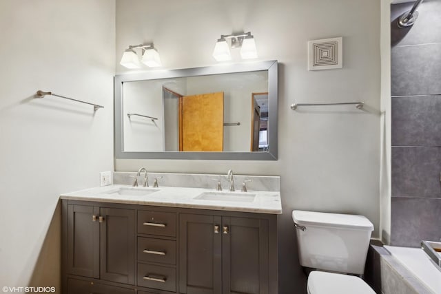 1000 W Washington Blvd Unit 320, Chicago, IL 60607 - bathroom featuring double vanity and toilet
