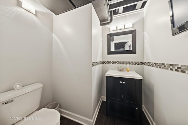 1581 Kenmore Ave, Aurora, IL 60505 - half bathroom featuring wood finished floors and vanity