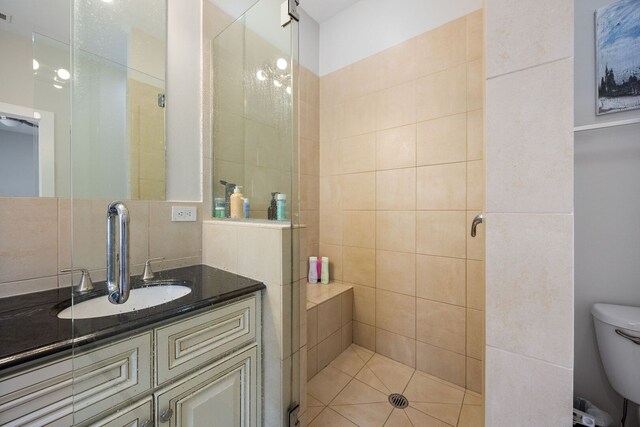 3126 W Walton St Unit 2, Chicago, IL 60622 - bathroom with a tile shower and vanity