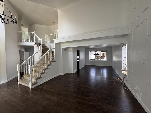 4550 Columbine Ln, Matteson, IL 60443 - foyer with a chandelier, a high ceiling, wood finished floors, and stairs