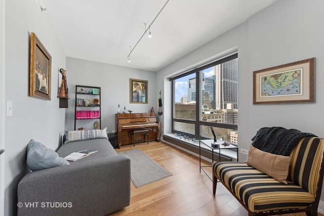 130 N Garland Ct Unit 2612, Chicago, IL 60602 - living room with wood finished floors, track lighting, and a city view