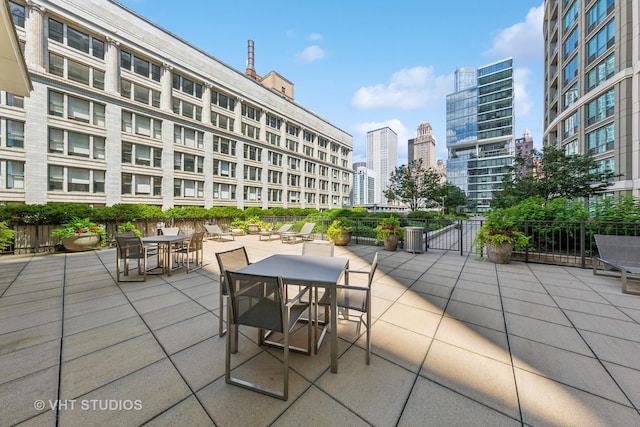 130 N Garland Ct Unit 2612, Chicago, IL 60602 - view of patio / terrace with a view of city and outdoor dining area