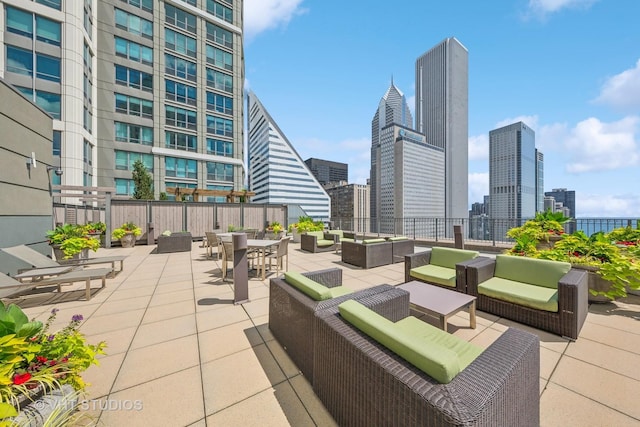 130 N Garland Ct Unit 2612, Chicago, IL 60602 - view of patio / terrace featuring an outdoor hangout area and a skyline view