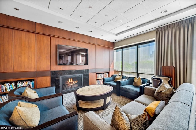 130 N Garland Ct Unit 2612, Chicago, IL 60602 - living area with a drop ceiling, a lit fireplace, and a raised ceiling