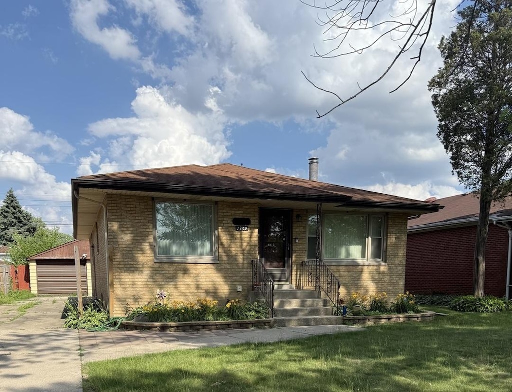 1369 Superior Ave, Calumet City, IL 60409 - view of front of property featuring brick siding and a front yard