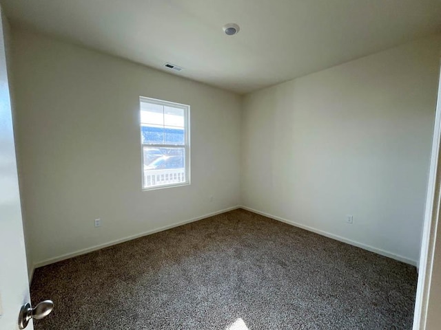 1095 Savannah Ln, Pingree Grove, IL 60140 - spare room featuring carpet flooring and baseboards