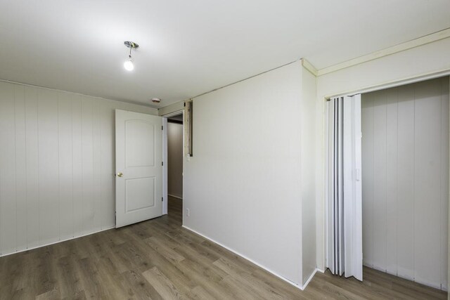 221 Kenwood Dr, Round Lake Park, IL 60073 - empty room with wood finished floors and baseboards