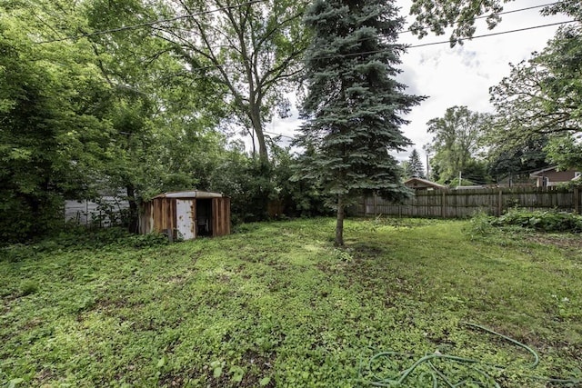 221 Kenwood Dr, Round Lake Park, IL 60073 - fenced backyard with a shed