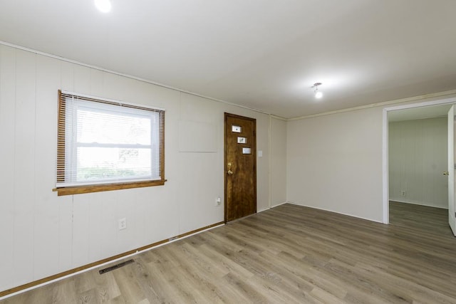 221 Kenwood Dr, Round Lake Park, IL 60073 - unfurnished room featuring wood finished floors