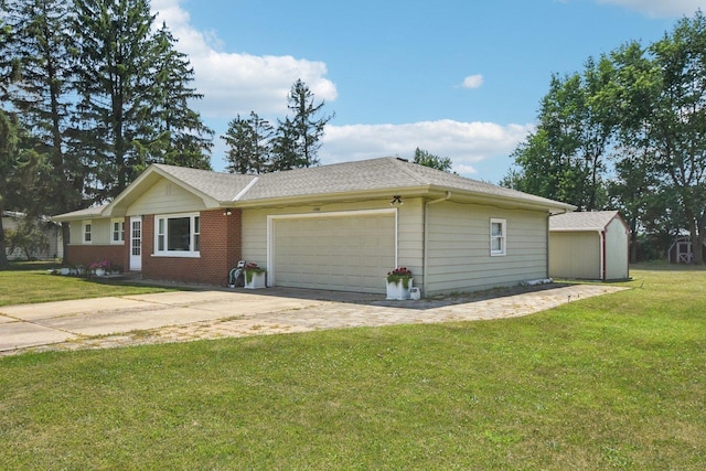 1745 Lyndale Rd, Aurora, IL 60506 - ranch-style home featuring an attached garage, driveway, a front yard, and brick siding