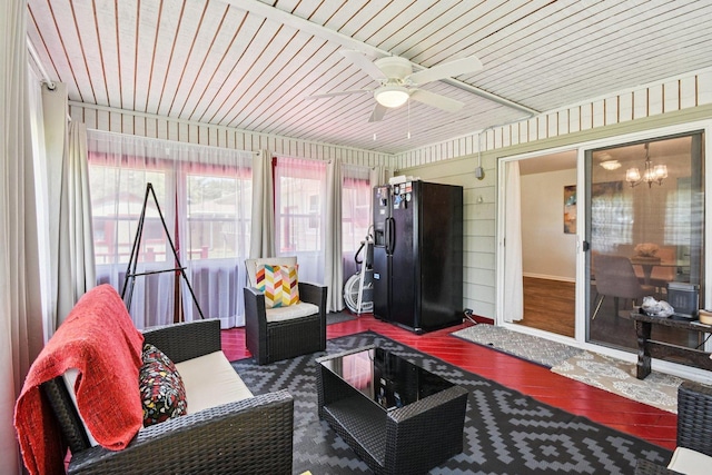 1745 Lyndale Rd, Aurora, IL 60506 - sunroom / solarium featuring wood-type flooring, ceiling fan, an outdoor hangout area, wood ceiling, and wood walls
